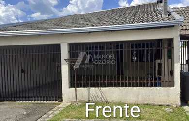 Imagem: A casa possui 2 Dormitórios, 1 Banheiro, 2 Vagas na garagem