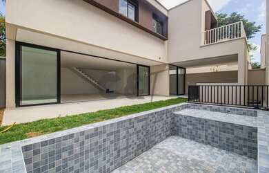 Imagem: A casa em condomínio possui 4 Dormitórios, 5 Banheiros, 4