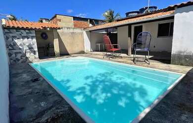 Imagem: A casa possui 2 Dormitórios, 2 Banheiros e está localizado