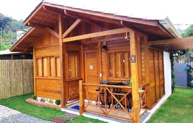 Imagem: A casa possui 1 Dormitório, Acomodam 4 pessoas, 1 Vaga na garagem