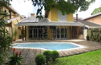 Imagem: A casa em condomínio possui 4 Dormitórios, 5 Banheiros, 4