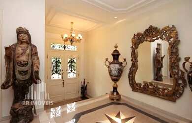 Imagem: A casa em condomínio possui 5 Dormitórios, 5 Banheiros, 5