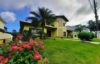 Imagem: A casa possui 4 Dormitórios, 5 Banheiros, 5 Vagas na garagem