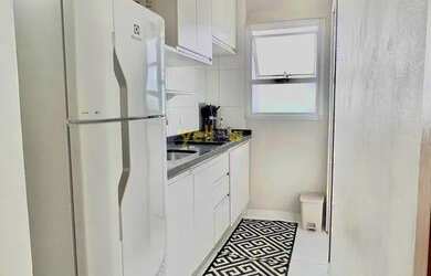 Imagem: O apartamento possui 2 Dormitórios, 1 Banheiro, 1 Vaga na garagem