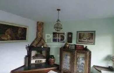 Imagem: A casa possui 4 Dormitórios, 5 Banheiros, 4 Vagas na garagem