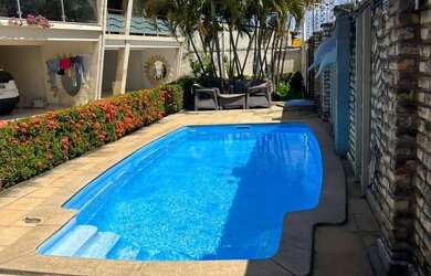 Imagem: A casa possui 4 Dormitórios, 4 Banheiros, 3 Vagas na garagem