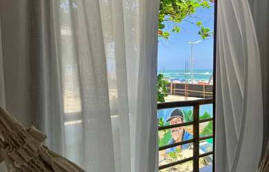 Imagem: A casa possui 2 Dormitórios, Acomodam 4 pessoas e está localizado