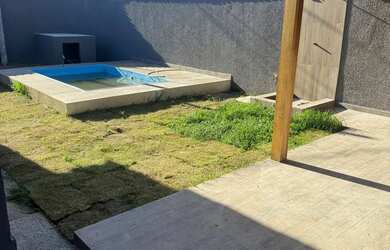 Imagem 4: Casa na 87 esquina meio terreno com piscina e churrasqueira