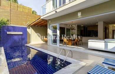 Imagem: A casa em condomínio possui 5 Dormitórios, 5 Banheiros, 3