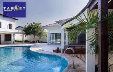 Imagem: A casa em condomínio possui 5 Dormitórios, 5 Banheiros, 5