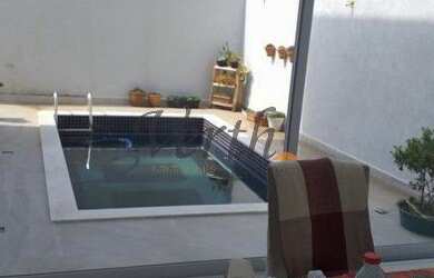 Imagem: A casa em condomínio possui 3 Dormitórios, 4 Banheiros, 4