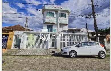 Imagem: A casa possui 3 Dormitórios, 1 Banheiro, 2 Vagas na garagem