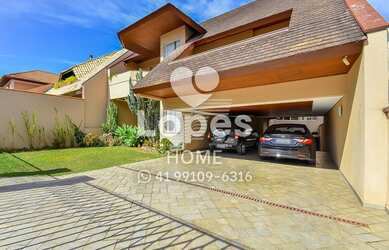 Imagem: A casa possui 5 Dormitórios, 5 Banheiros, 5 Vagas na garagem