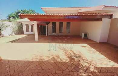 Imagem: A casa possui 3 Dormitórios, 5 Banheiros, 5 Vagas na garagem