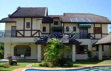 Imagem: A casa em condomínio possui 4 Dormitórios, 5 Banheiros, 5