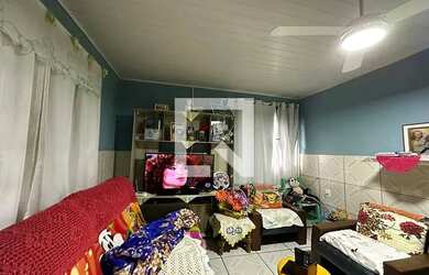 Imagem: A casa possui 2 Dormitórios, 2 Banheiros, 1 Vaga na garagem