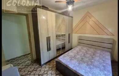 Imagem: A casa possui 2 Dormitórios, 1 Banheiro, 2 Vagas na garagem