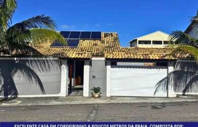 Imagem: A casa possui 2 Dormitórios, 3 Banheiros, 2 Vagas na garagem