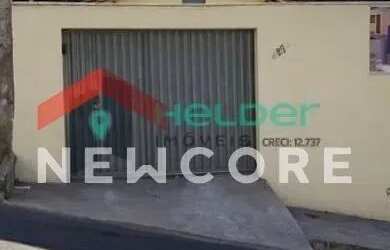 Imagem: A casa possui 3 Dormitórios, 1 Banheiro, 2 Vagas na garagem