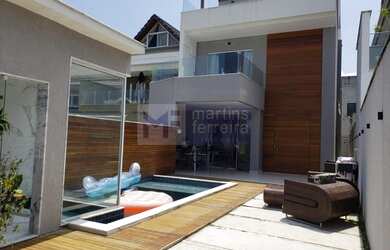 Imagem: A casa em condomínio possui 4 Dormitórios, 5 Banheiros, 2