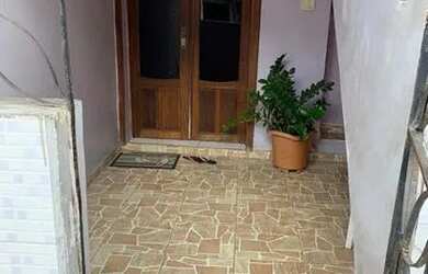 Imagem: A casa possui 3 Dormitórios, 2 Banheiros e está localizado