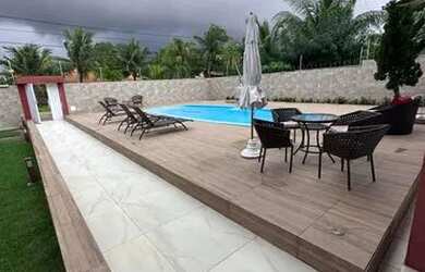 Imagem: A casa em condomínio possui 5 Dormitórios, 1 Banheiro, 2 Vagas