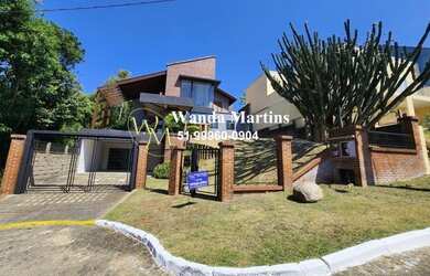 Imagem: A casa em condomínio possui 3 Dormitórios, 3 Banheiros, 2