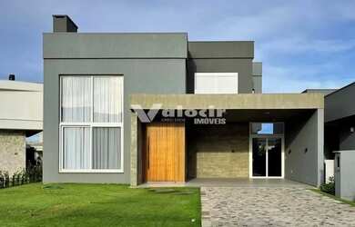 Imagem: A casa em condomínio possui 5 Dormitórios, 5 Banheiros, 2