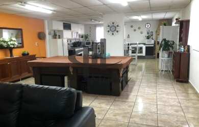 Imagem: A casa possui 3 Dormitórios, 3 Banheiros, 3 Vagas na garagem