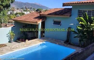 Imagem: A casa possui 4 Dormitórios, 4 Banheiros, 2 Vagas na garagem