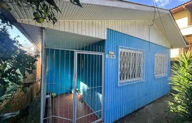 Imagem: A casa possui 5 Dormitórios, 2 Banheiros, 116m² de Área e