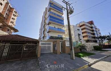 Imagem: O apartamento possui 3 Dormitórios, 1 Banheiro, 2 Vagas na