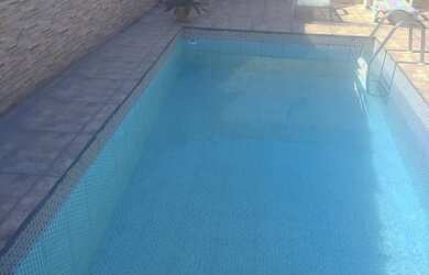 Imagem: A casa possui 2 Dormitórios, 5 Vagas na garagem e está localizado