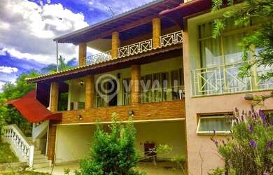 Imagem: A casa em condomínio possui 5 Dormitórios, 5 Banheiros, 3