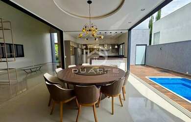 Imagem: A casa em condomínio possui 4 Dormitórios, 5 Banheiros, 2