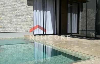 Imagem: A casa possui 3 Dormitórios, 4 Banheiros, 4 Vagas na garagem