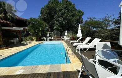 Imagem: A casa em condomínio possui 5 Dormitórios, 5 Banheiros, 3