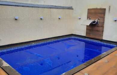 Imagem: A casa à venda possui 3 Dormitórios, 3 Banheiros e 4 Vagas