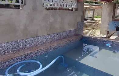 Imagem: A casa possui 3 Dormitórios e está localizado em Ilha de