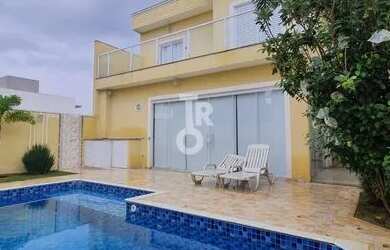 Imagem: A casa possui 3 Dormitórios, 5 Banheiros, 3 Vagas na garagem