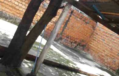 Imagem: A casa possui 3 Dormitórios, 2 Banheiros, 1 Vaga na garagem