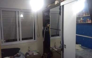 Imagem: O apartamento possui 3 Dormitórios, 1 Banheiro, 1 Vaga na garagem