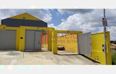 Imagem: A casa possui 2 Dormitórios, 1 Banheiro, 2 Vagas na garagem