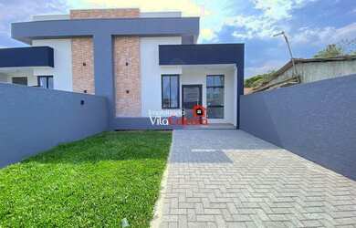 Imagem: A casa possui 3 Dormitórios, 2 Banheiros, 1 Vaga na garagem