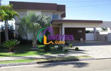 Imagem: A casa possui 3 Dormitórios, 5 Banheiros, 4 Vagas na garagem