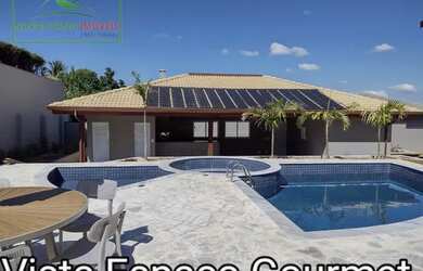 Imagem: A casa em condomínio possui 5 Dormitórios, 5 Banheiros, 3