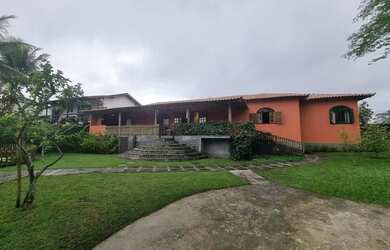 Imagem: A casa possui 5 Dormitórios, 5 Banheiros, 5 Vagas na garagem