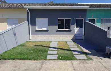 Imagem: A casa em condomínio possui 2 Dormitórios, 1 Banheiro, 2 Vagas