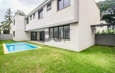 Imagem: A casa em condomínio possui 4 Dormitórios, 5 Banheiros, 5