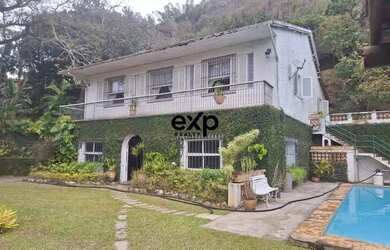 Imagem: A casa à venda possui 4 Dormitórios, 2 Banheiros, 4 Vagas